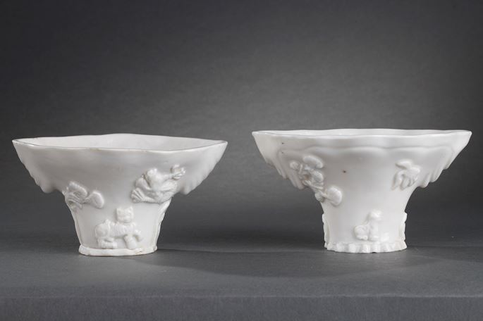 Pair of &quot;blanc de Chine&quot; rhinoceros horn shaped cups with animals decoration like: tiger dragon deer or crane | MasterArt